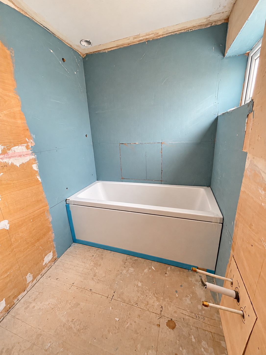 Sandwich Bay bathroom during bath installation