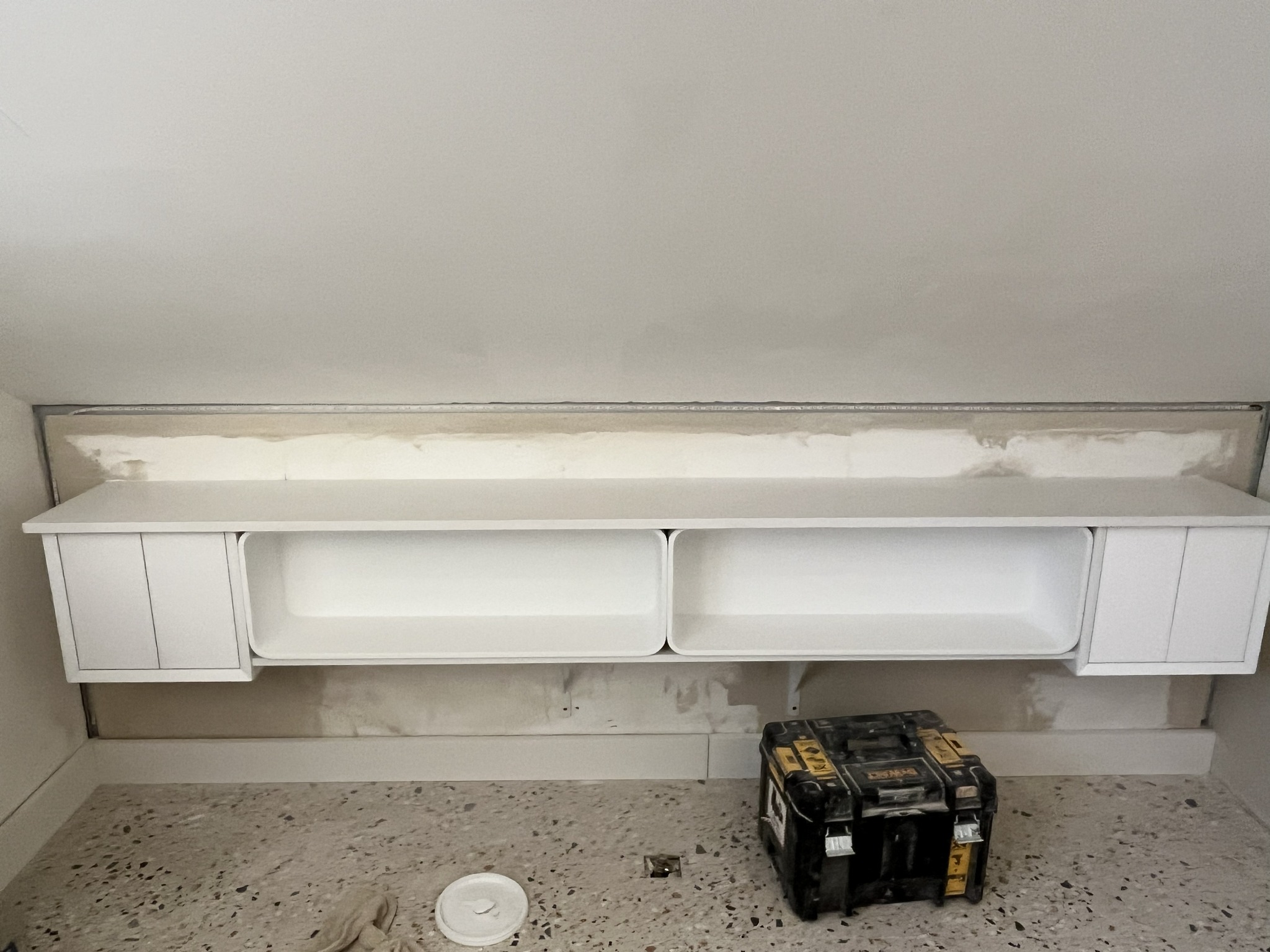 Bespoke wall-mounted bathroom furniture under construction