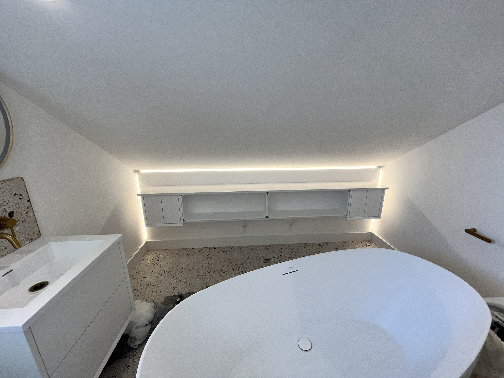 Bespoke bathroom furniture with concealed lighting